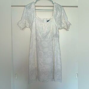 White mid/mini dress with zipper closure in the back. Perfect summer dress